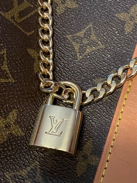 louis vuitton altair golden turn-lock clasp at front|authentic louis vuitton locks.